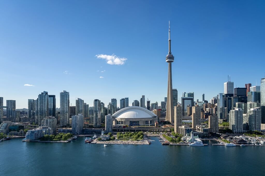 About Us 8 a city skyline with a large white dome and a large white building
